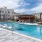 Resort-style swimming pool with lounge seating