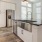 Well-lit kitchen with ample counter space